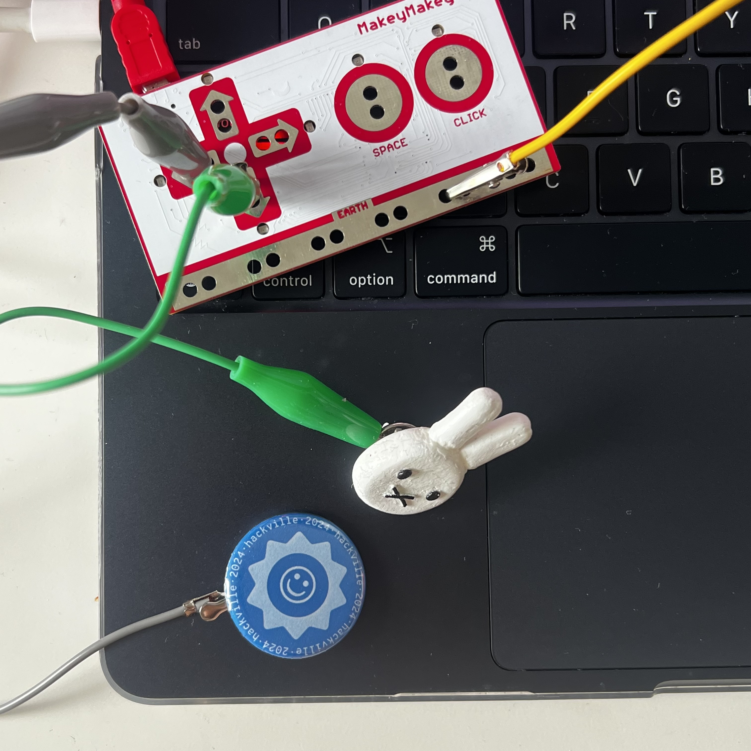 Using the metal clip of pins as buttons